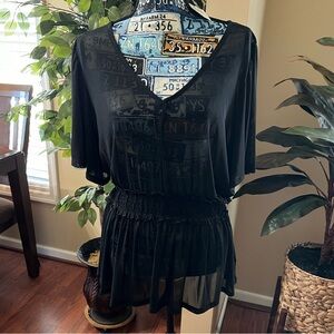 NWT. Torrid Sheer Mesh Flutter Sleeve Top with Smocked Waist. Size 2 Black.